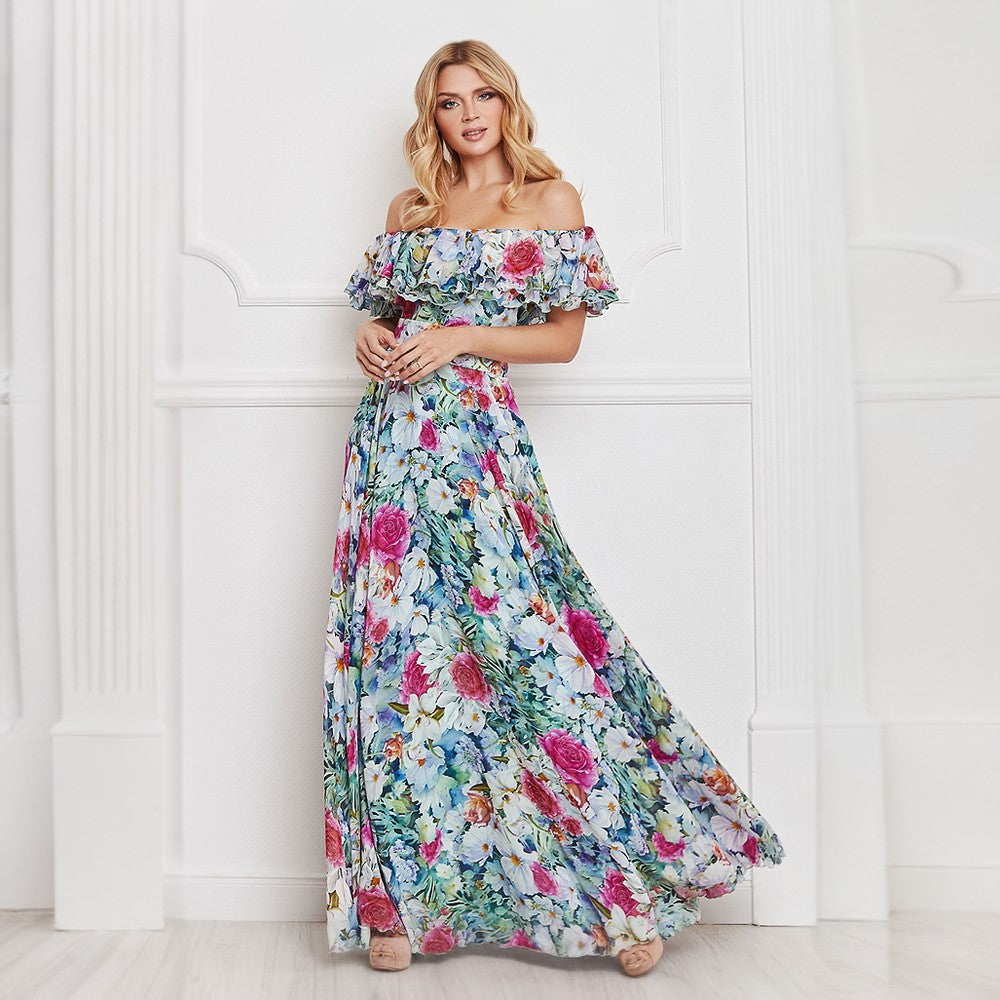 This silk maxi dress is romanced with floral work. Off-shoulder and playfully detailed with ruffle trim.