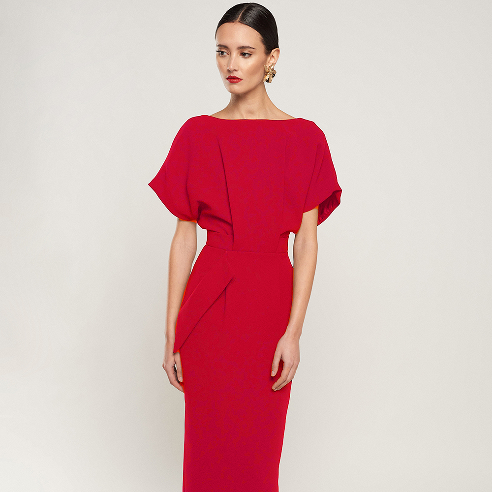 Midi dress with side pocket and back V-neckline. A good wardrobe essential to be the perfect guest. Available in Red and Navy Blue. Shop now!