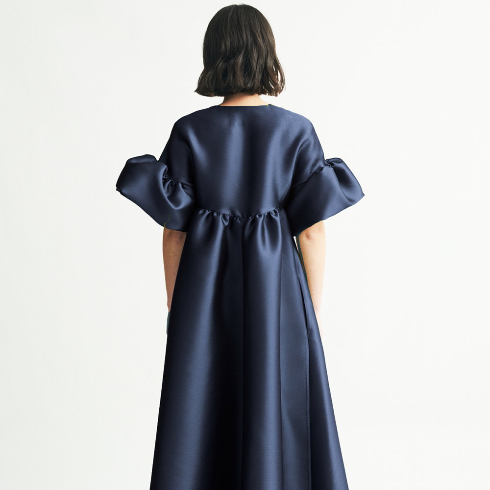 Shop the Maruja coat-dress, a very versatile designer dress for women, perfect to be a wardrobe essential. Shop now!