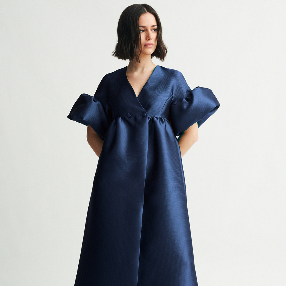 Shop the Maruja coat-dress, a very versatile designer dress for women, perfect to be a wardrobe essential. Shop now!