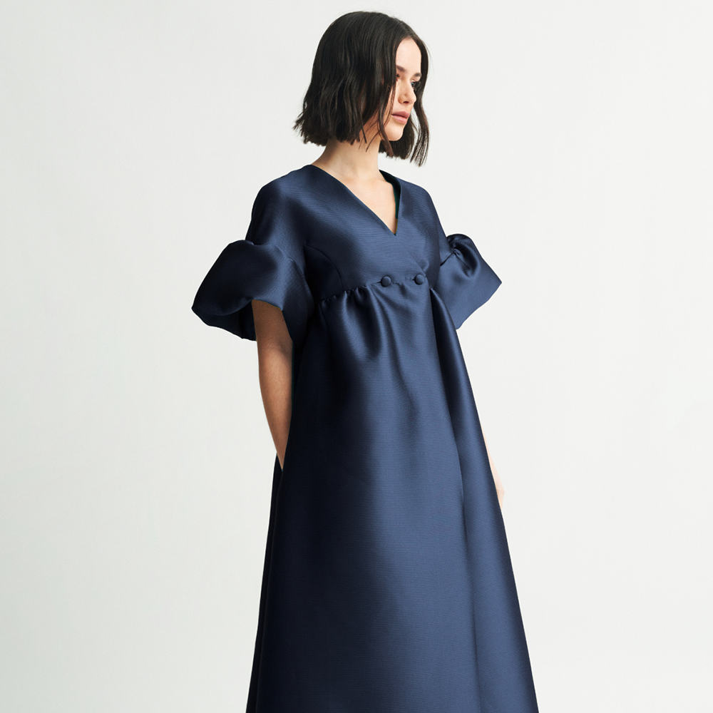 Shop the Maruja coat-dress, a very versatile designer dress for women, perfect to be a wardrobe essential. Shop now!