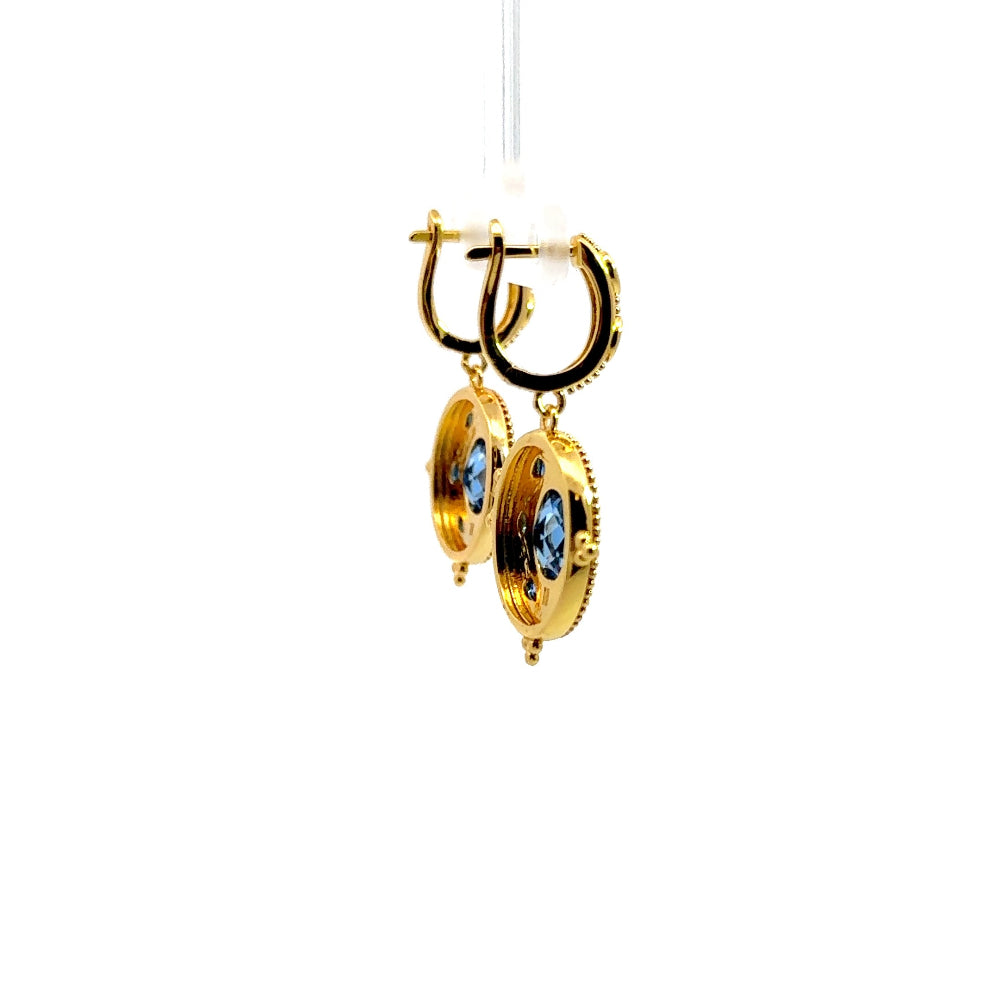 Statement 22K gold plated drop earrings with faceted created Spinel, marquise accents, and rich red enamel detailing. Perfect for elegant occasions. Shop premium jewelry online.