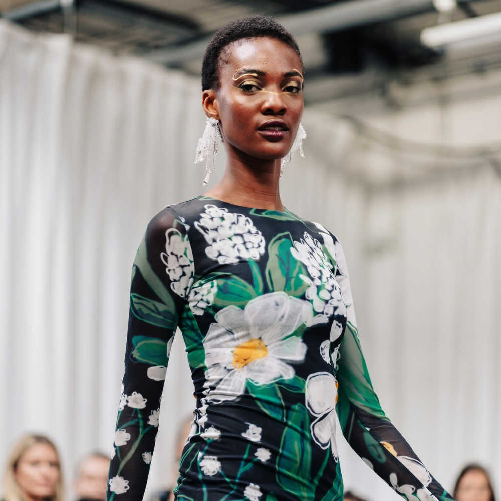 Chic floral midi dress in recycled mesh with nature-inspired print. Elegant, sustainable style. Shop premium styles online.