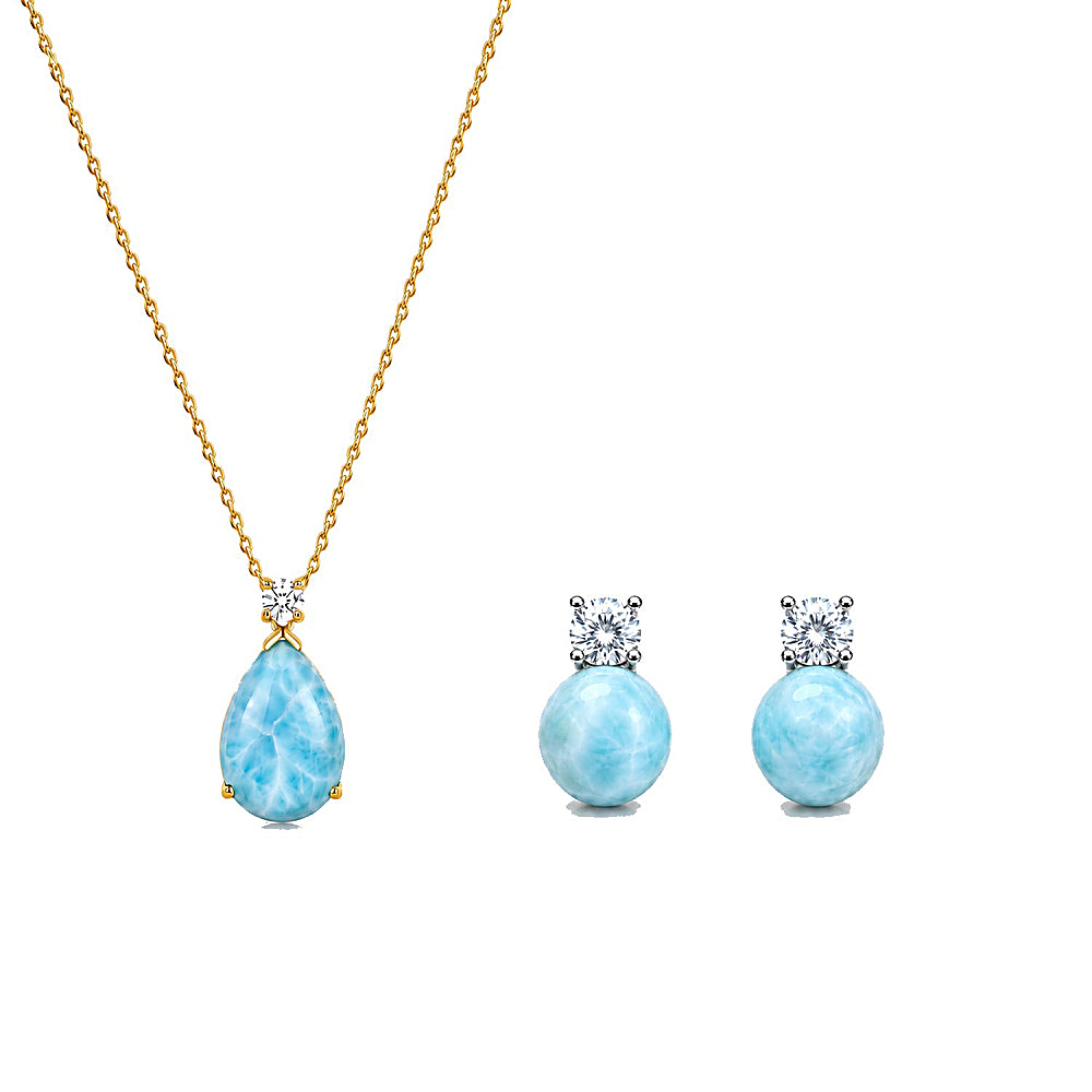 Discover the Mermaid's Tear Larimar Necklace & Earrings Jewelry Set at The Luxe Maison, featuring natural Larimar gemstones with unique ocean-blue patterns and sparkling cubic zirconia accents. Inspired by the turquoise waters of the Caribbean Sea, this elegant matching set celebrates the rare beauty of Larimar, found exclusively in the Dominican Republic. Wear the pieces together for a statement look or separately for effortless elegance, making it a perfect gift for ocean lovers and nature-inspired jewelr