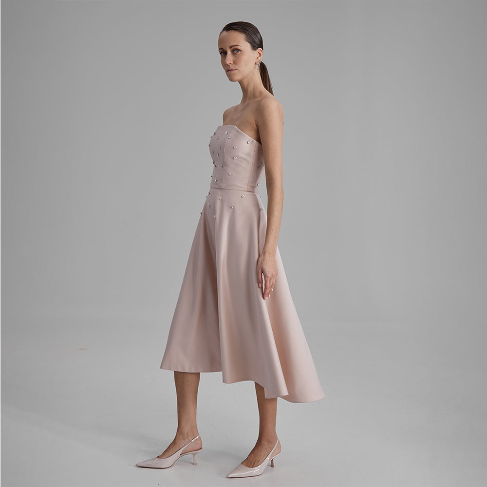 Shop midi nude dress with diamonds. Elevate your wardrobe with this timeless piece for seamless transitions. Shop designer dresses for women. Shop now!