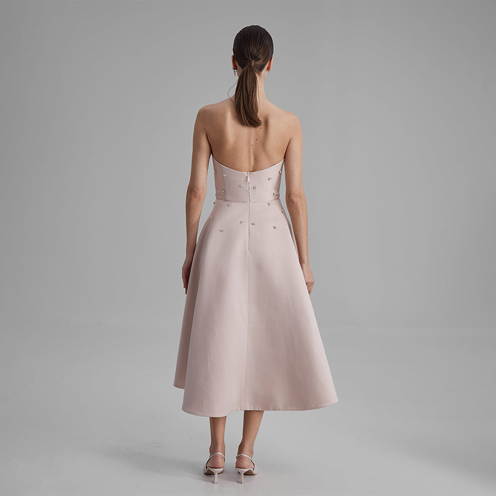 Shop Apricot Midi dress with A-line skirt, removable side bow, cinched waistline & strapless corset. Shop designer dresses for women. Shop now!