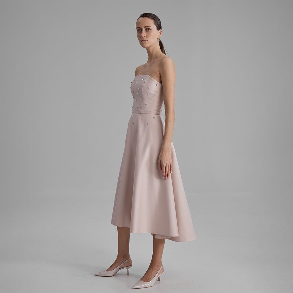 Shop midi nude dress with diamonds. Elevate your wardrobe with this timeless piece for seamless transitions. Shop designer dresses for women. Shop now!