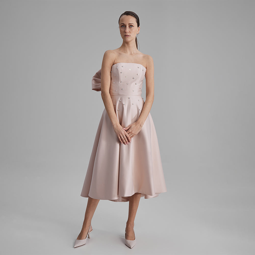 Shop Apricot Midi dress with A-line skirt, removable side bow, cinched waistline & strapless corset. Shop designer dresses for women. Shop now!