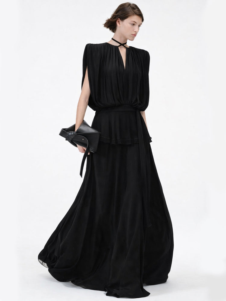 Shop online from our exclusive website and discover the Midnight Drape Evening Gown in eucalyptus silk by Benedetti Life, featuring a flowing silhouette and sustainable luxury design.