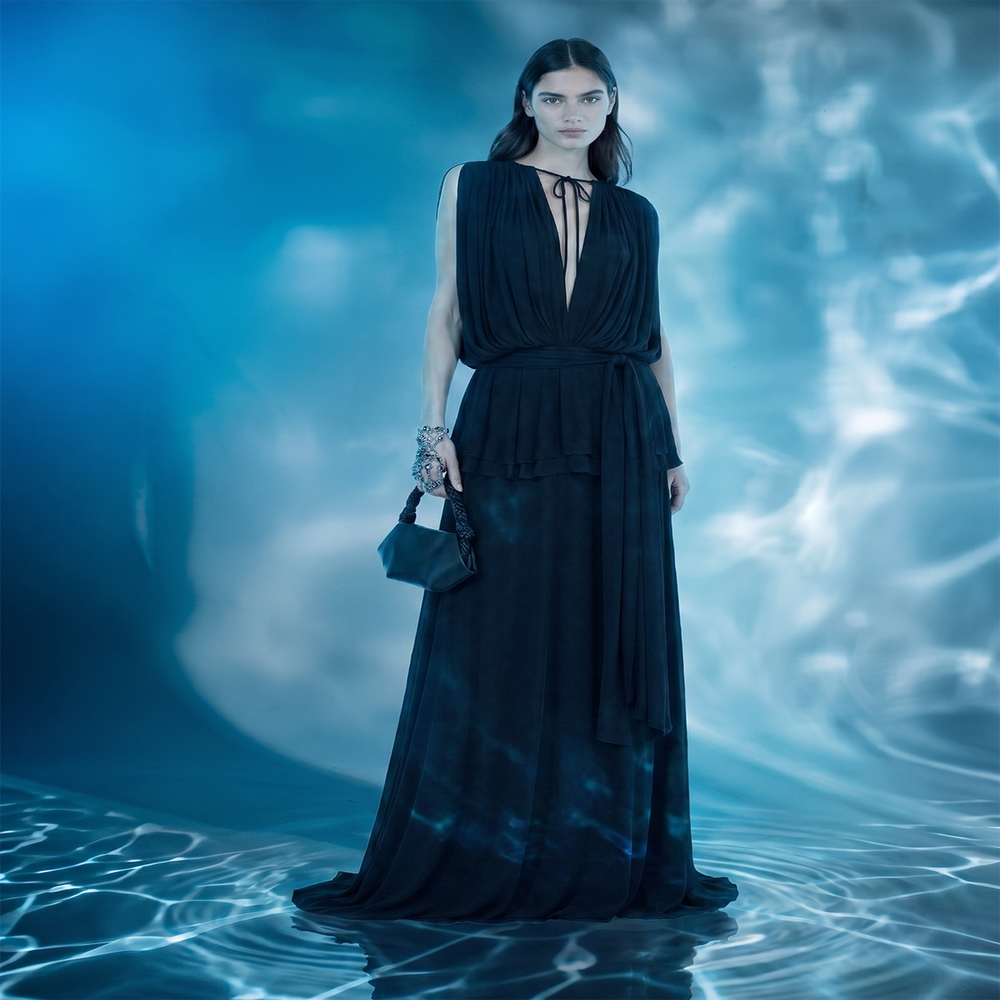 Shop online from our exclusive website and discover the Midnight Drape Evening Gown in eucalyptus silk by Benedetti Life, featuring a flowing silhouette and sustainable luxury design.