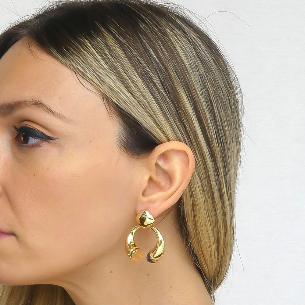 Shop online premium gold plated spring earrings with pyramidal crystals and pave cubic zirconia base in elegant dangler style.