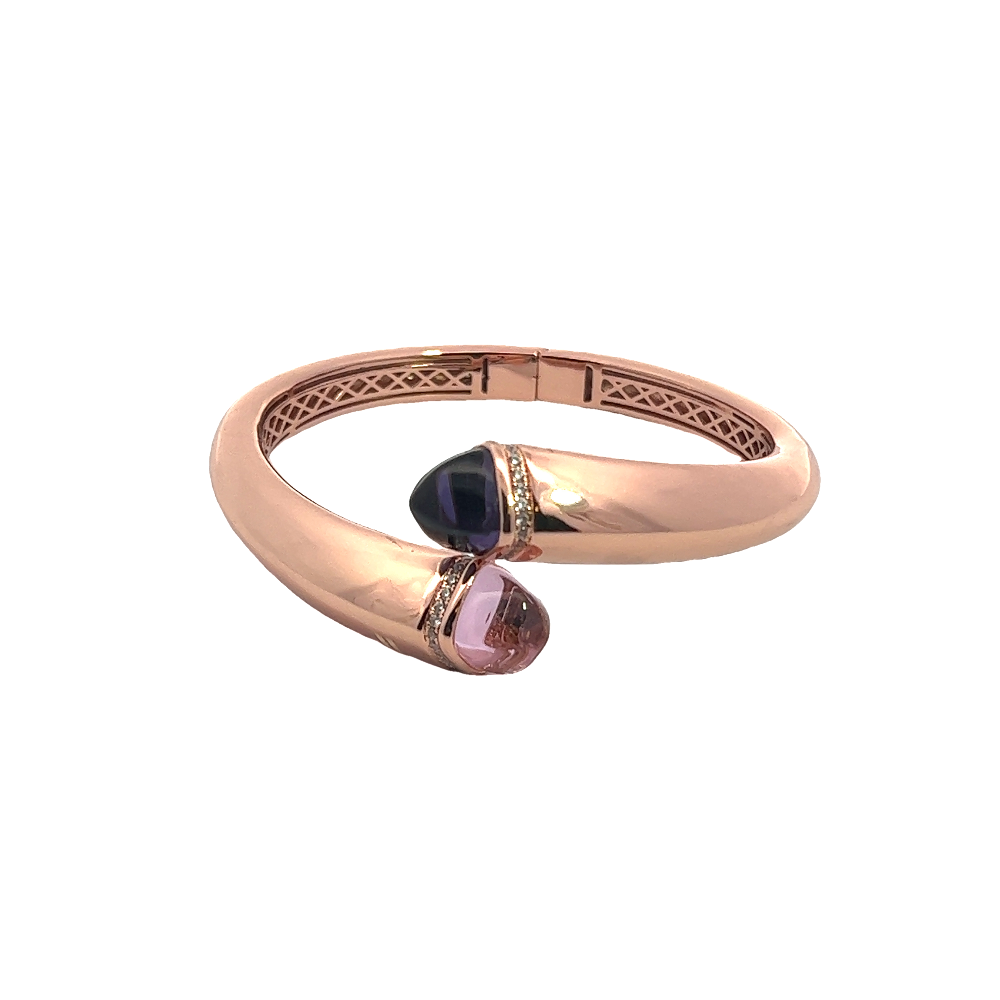 Elegant rose gold plated cuff bracelet with colored pyramidal crystals and pavé cubic zirconia accents. A chic luxe accessory for every occasion. Shop premium jewelry online.