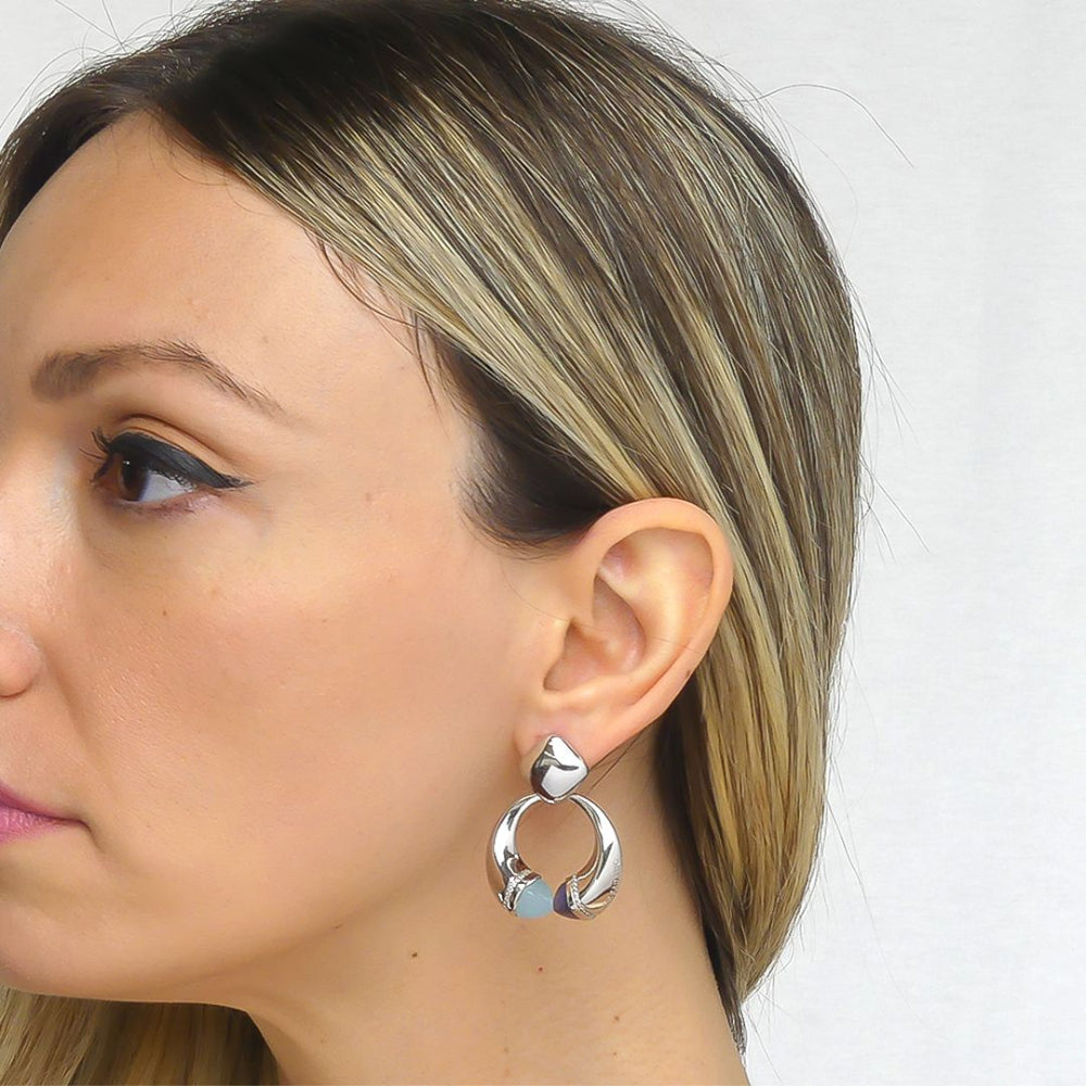 Shop online premium rhodium plated spring earrings with pyramidal crystals and pave cubic zirconia base for elegant everyday styling.