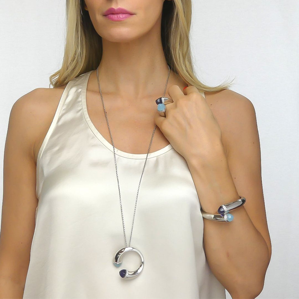 Shop online premium rhodium plated circle pendant necklace with colored crystals and sparkling CZ stones.
