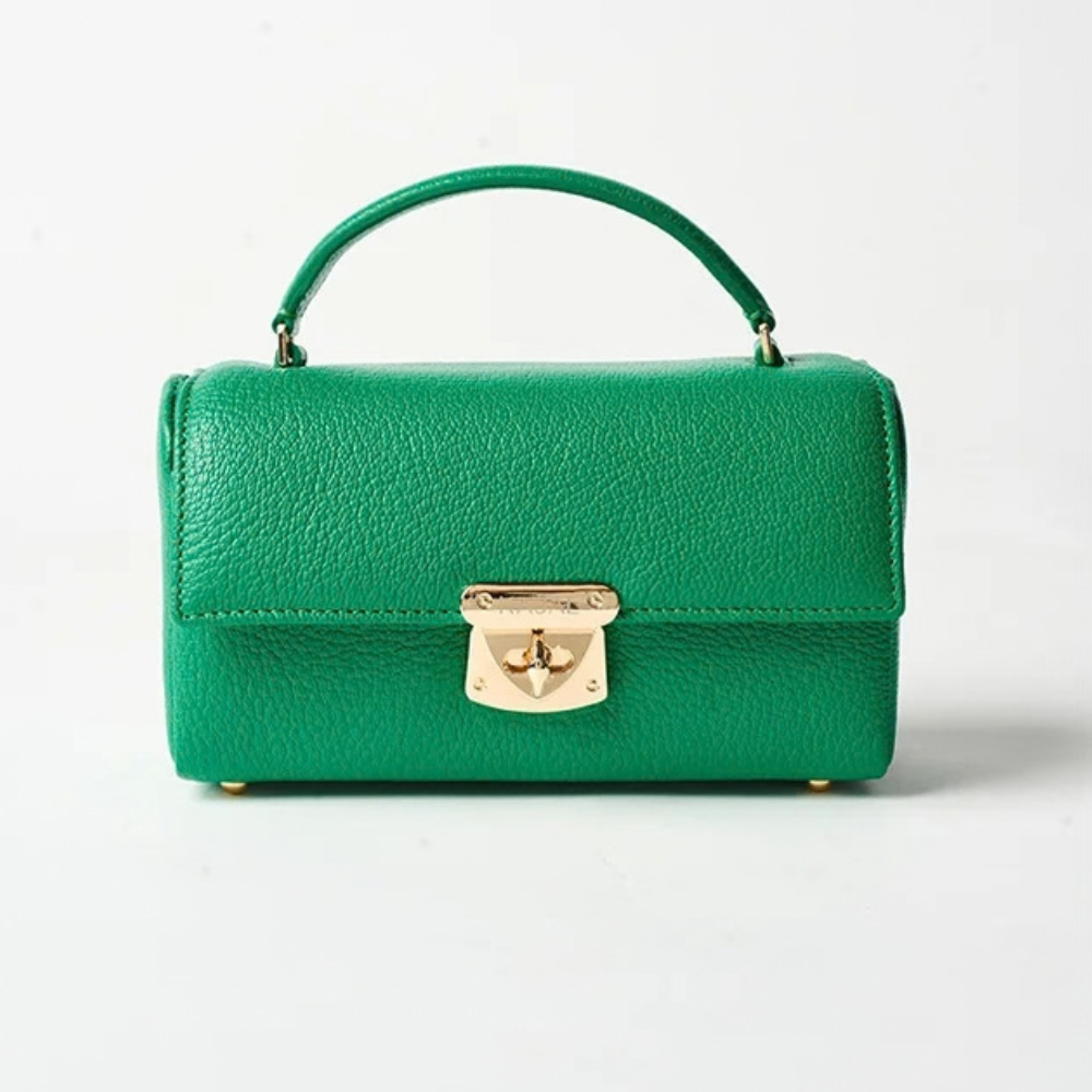 Shop online from our exclusive website. Discover the Mini Trove Bag, a versatile 4-in-1 design that can be styled as a crossbody, shoulder bag, belt bag, or clutch.