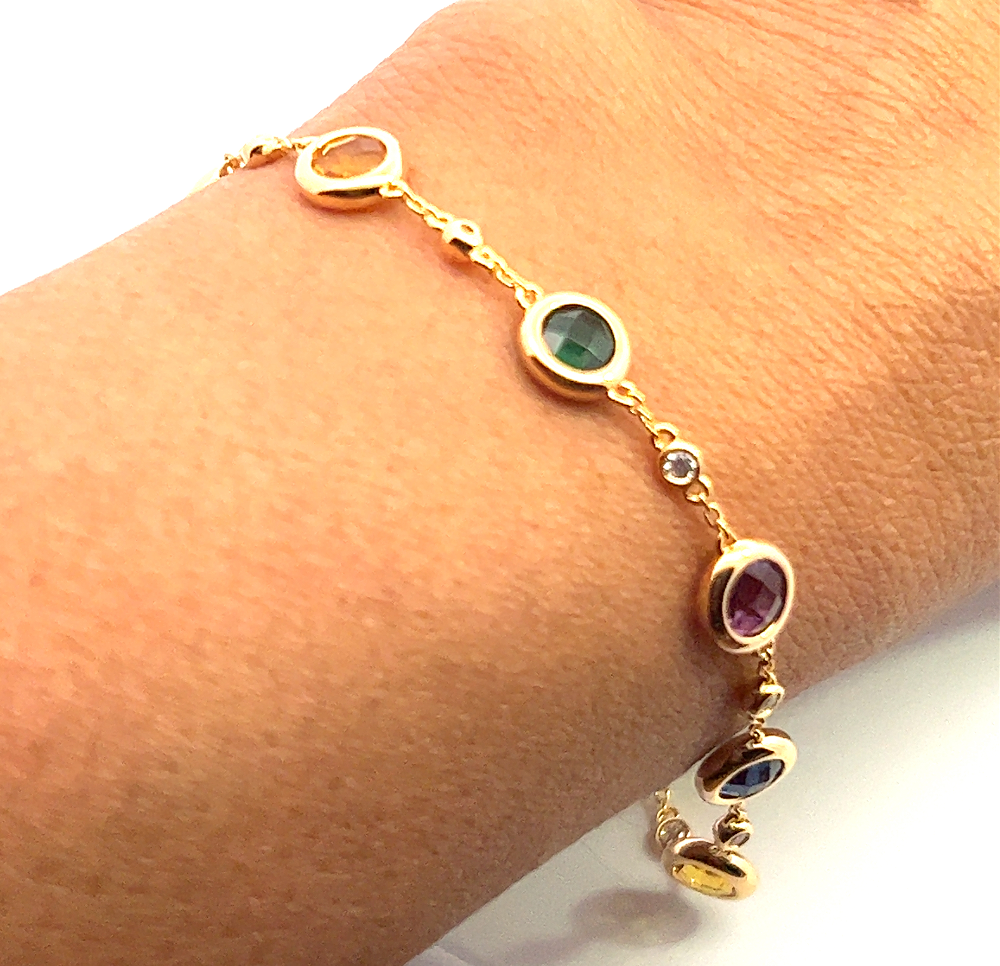 Sterling silver 18k gold-dipped bracelet with cubic zirconia, green nano sital, lab-created blue and white sapphires, amethyst, and citrine accents. Shop premium jewelry online.