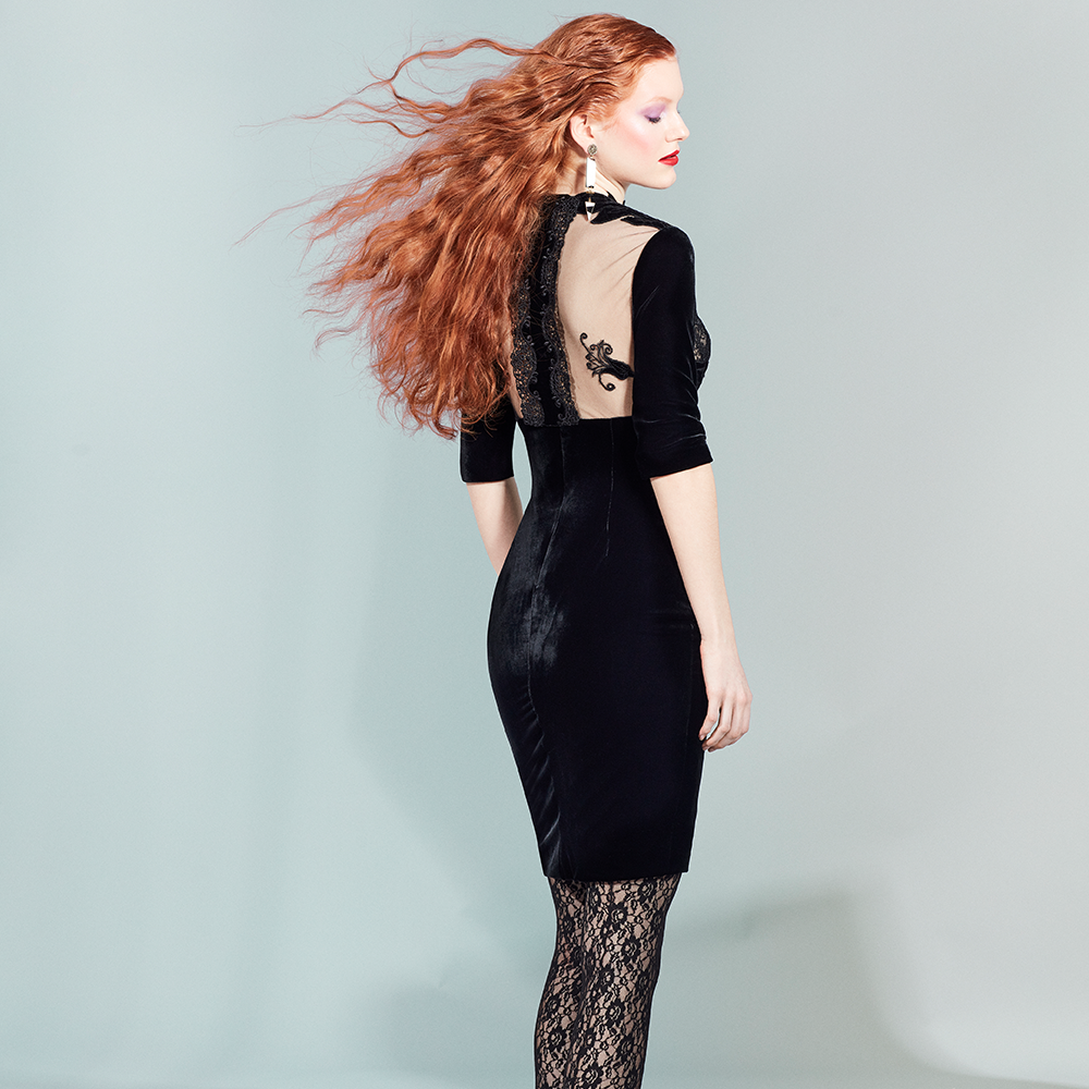 In black velvet, french sleeves and above the knee length with a transparent tulle back embroidered with french lace.