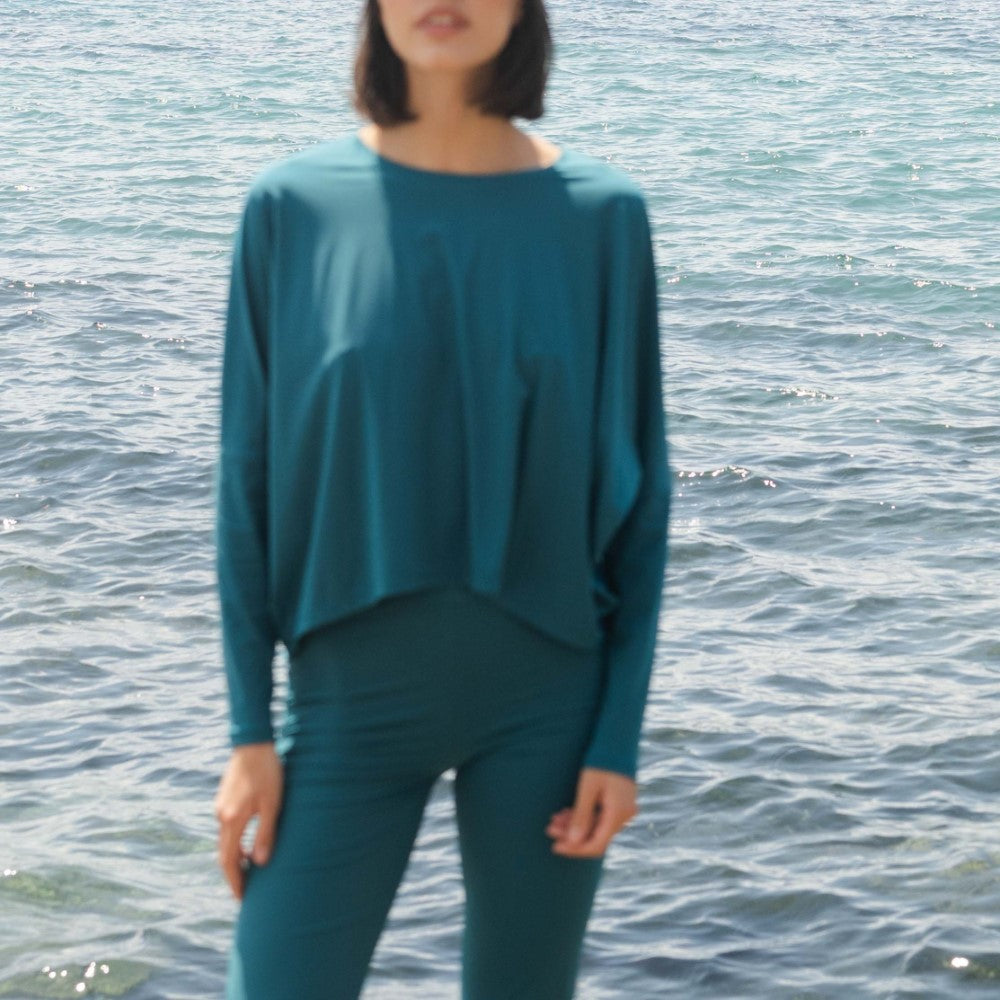 Mykonos UV Top designer top made for refined beauty. Shop Now!