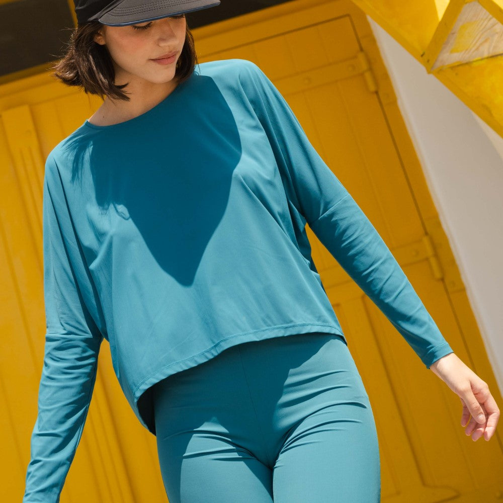 Mykonos UV Top designer top made for refined beauty. Shop Now!