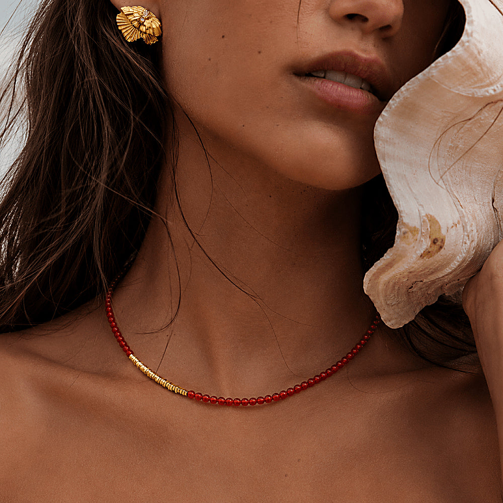Discover the Navajo Carnelian & Golden Nugget Beaded Necklace at The Luxe Maison, featuring rich red carnelian beads and golden nugget accents for a bold, earthy look with radiant warmth and timeless appeal.