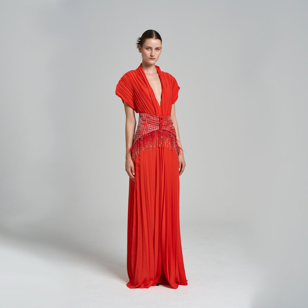 Hand embroidered belt included .Pleated .Fringe details .Short sleeved .Waist elastic detail .Maxi evening dress