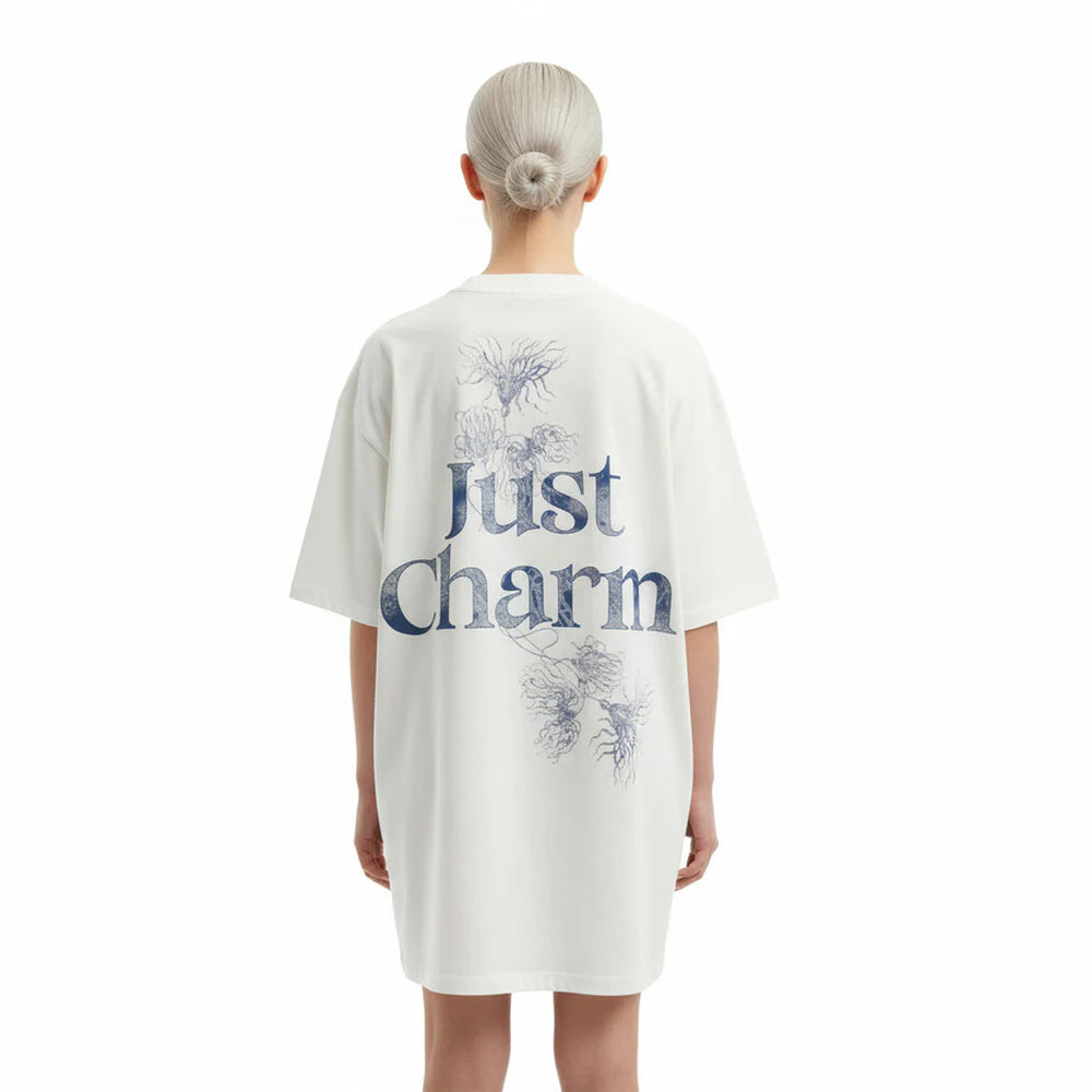 Shop online from our exclusive website and discover the No Harm, Just Charm Oversized Eco Unisex T-Shirt by Benedetti Life, crafted from soft organic cotton jersey for breathable comfort and sustainable everyday style.