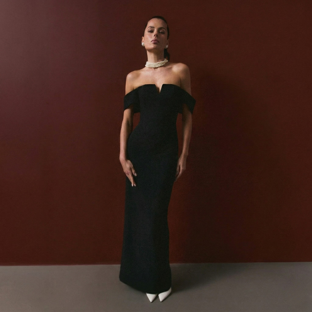 Elegant full-length corset dress featuring a stylish shoulder accent for a bold, refined look. Shop now at our exclusive clothing website.