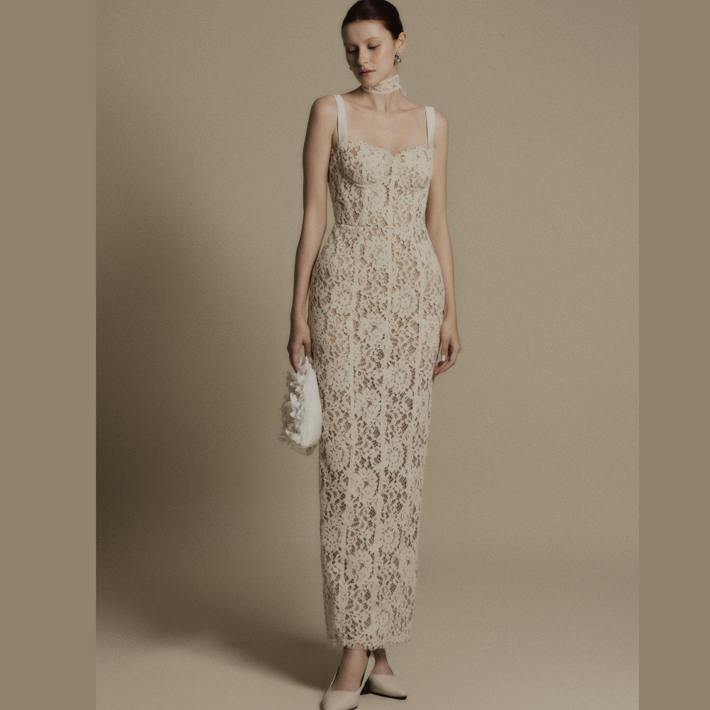 Explore our clothing shop online for the refined and stylish Noir Waist Ivory Lace Dress. Shop Now!