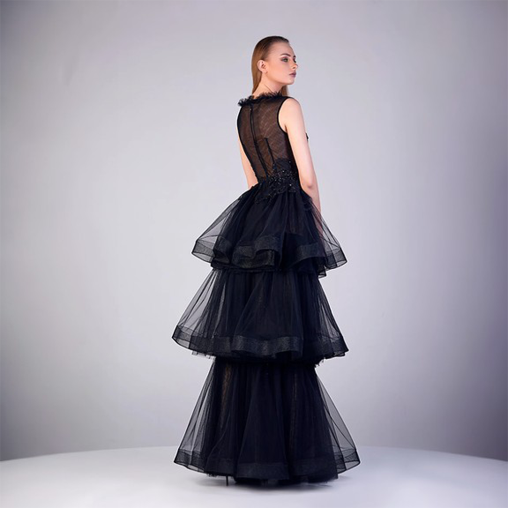Deep V neck with cut sleeves fitted embroidered bodice and three layers connected skirt lower bodice. 