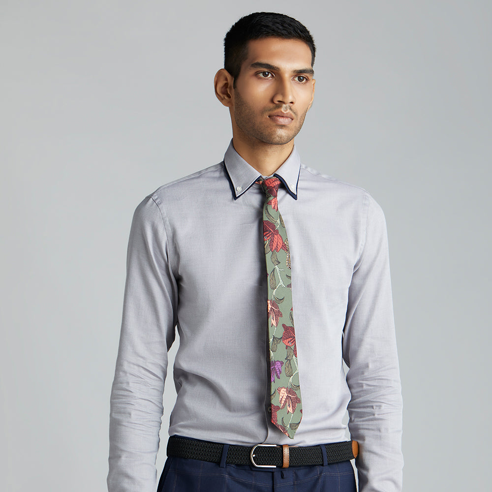 Under the Bougainvillae is a pink and khakhi green tie with unique floral styling works perfectly with casuals or formals.