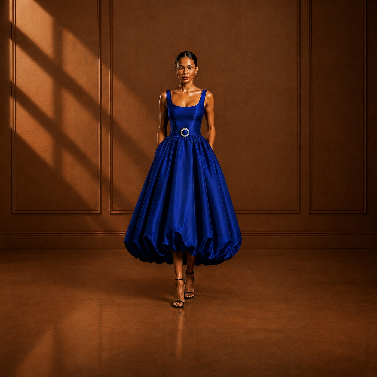 Explore the OSA dress crafted with a sculpted bodice, elegant scoop neckline, statement belt, and dramatic bubble skirt. A refined designer piece for modern occasion dressing.