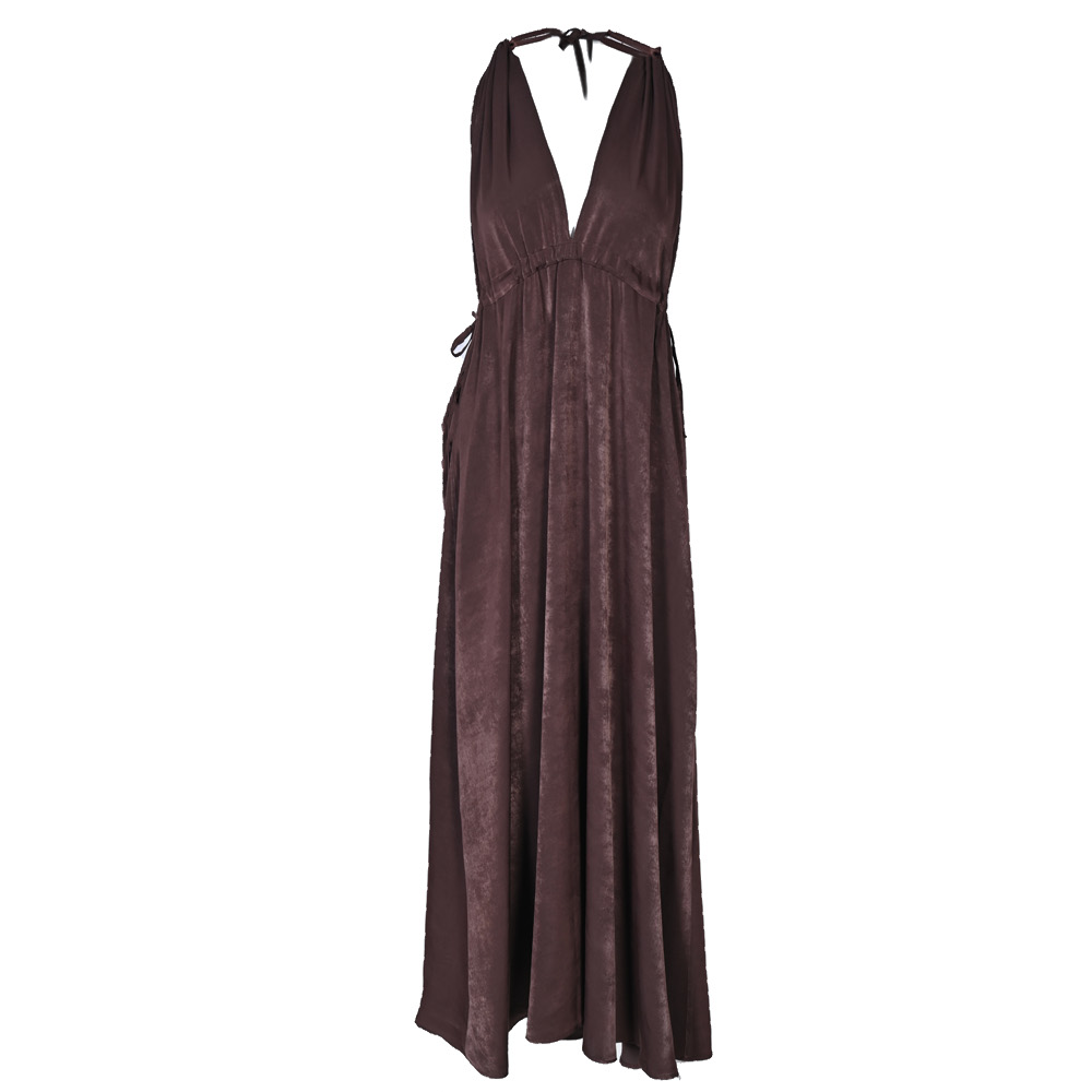 The Oasis (Vaha) dress, crafted from brown silk viscose, is a stunning piece that exudes elegance.