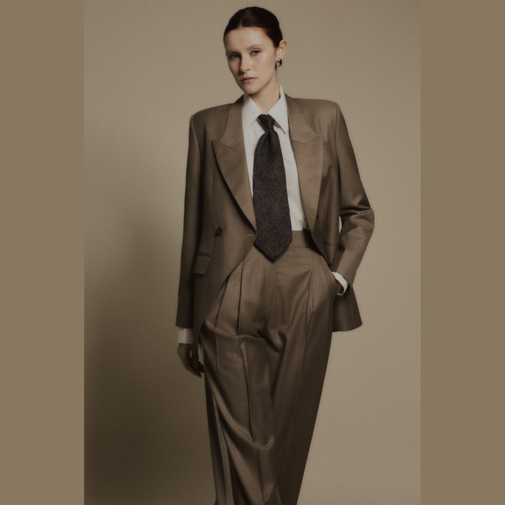 Elevate your wardrobe with women's wear essentials like the chic Obsidian Wool Trousers. Shop Now!