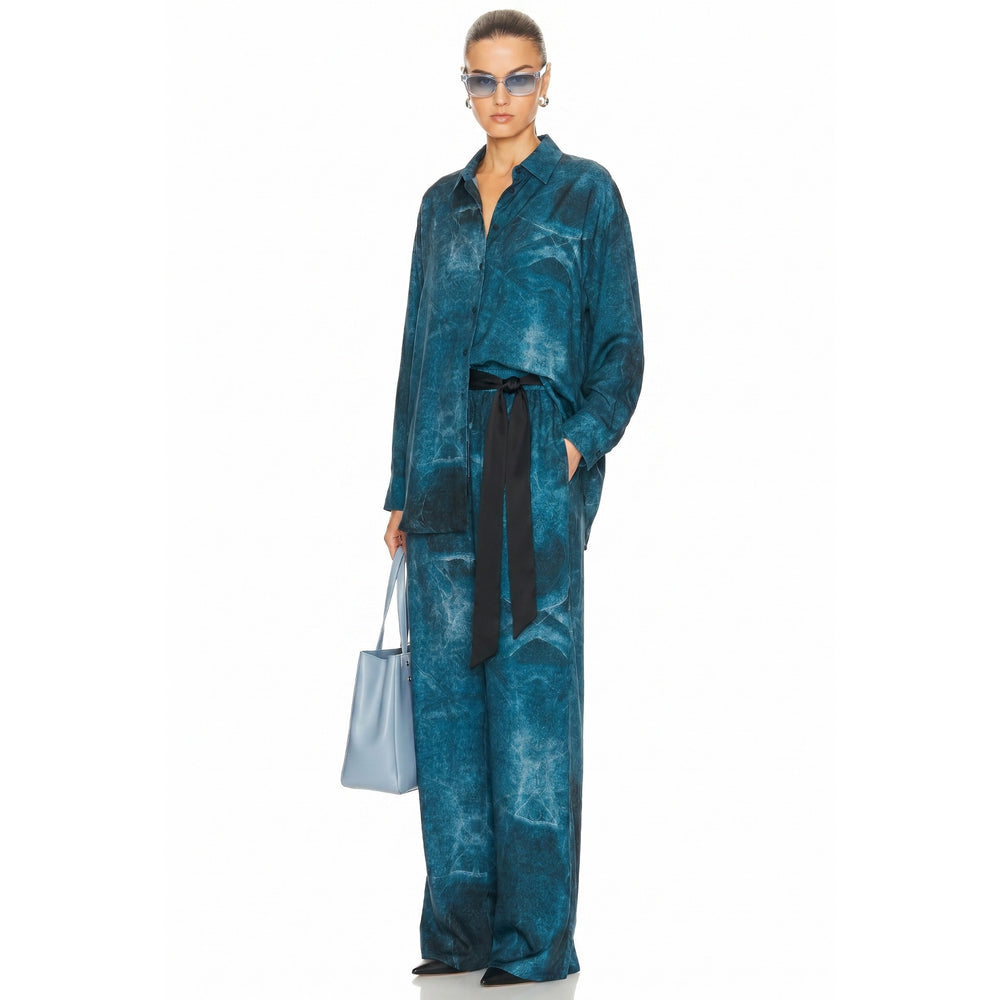 Shop online from our exclusive website and discover the Ocean Icosahedron Day To Night Pajama by Benedetti Life, crafted from soft eucalyptus fiber for breathable comfort and sustainable luxury.