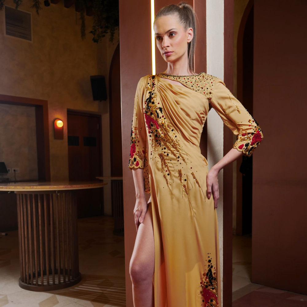 Stunning off-shoulder yellow crepe dress adorned with vibrant multicolor embroidery