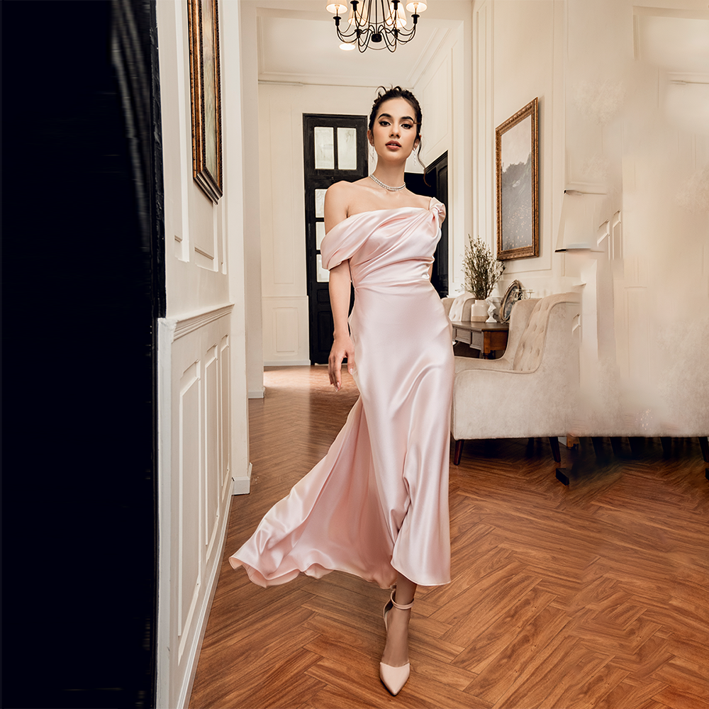 Discover timeless elegance with our off-the-shoulder silk dress, the epitome of luxury women's wear.