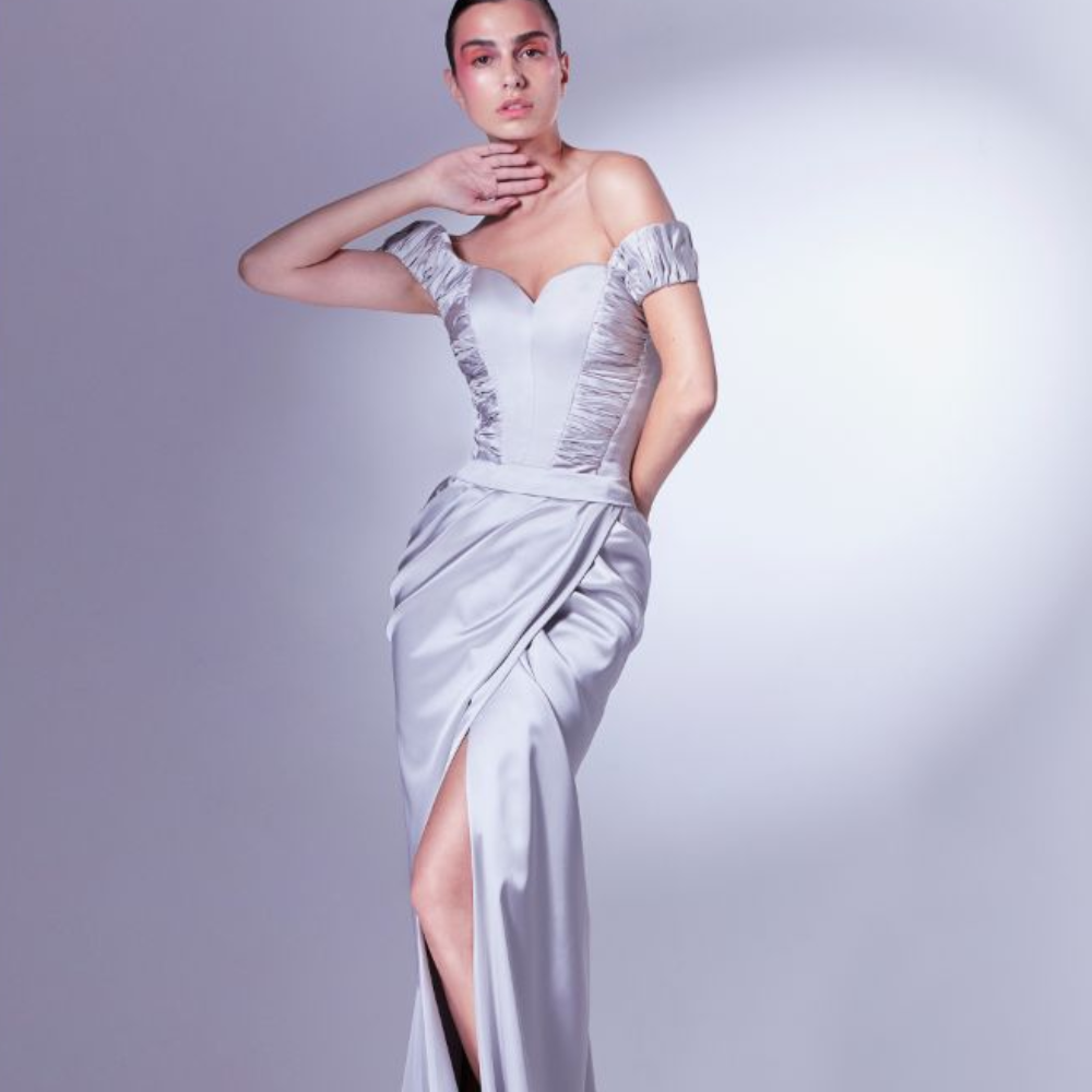 Daring and wild, this corset satin dress is beautifully crafted with pleated off the shoulder details.