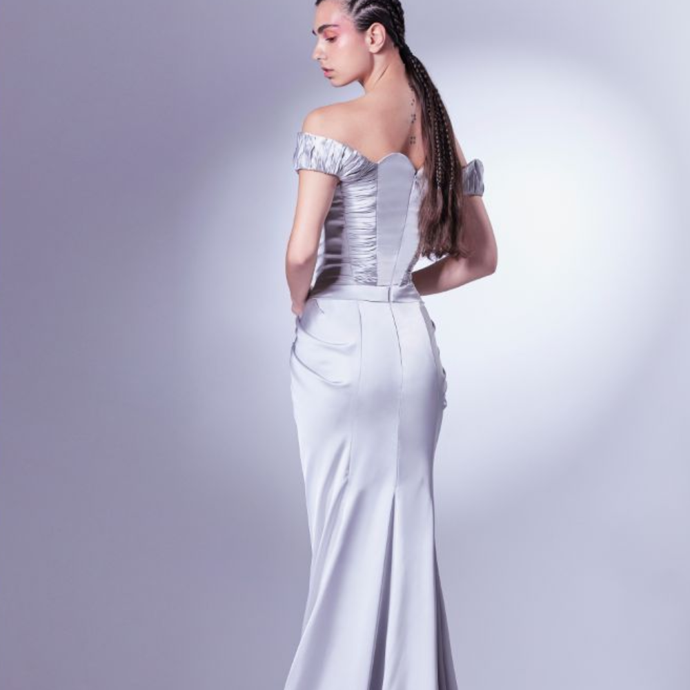 Daring and wild, this corset satin dress is beautifully crafted with pleated off the shoulder details.