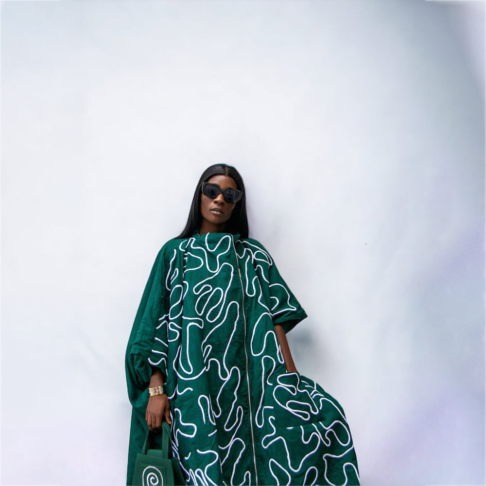 Explore elegant women dresses with the Okun Poncho 2.0. Shop Now!