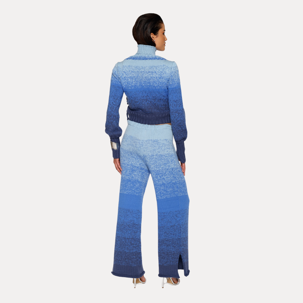 Shop online from our exclusive website. Discover the Ombre Bleu Merino Wool Sweater, hand-knitted by artisans with a soft gradient effect and a unique finish.
