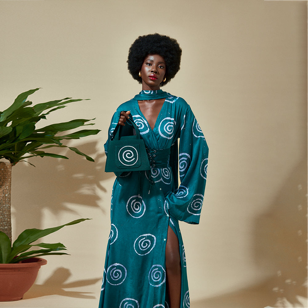 Transform your wardrobe with Omu Silk Dress's stylish design. Shop Now!