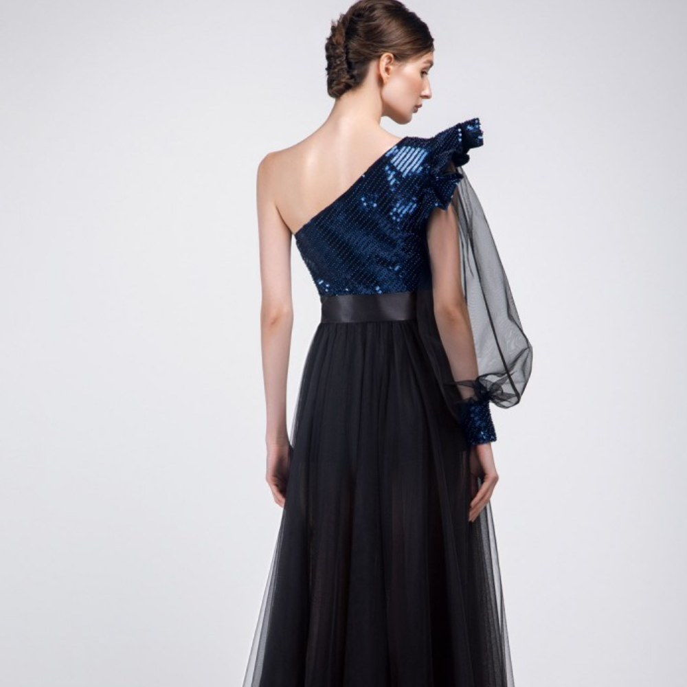 One shoulder, Puffy sleeves Floor lenth long dress. Beaded royal blue sequined top and a black multi layered tulle skirt .