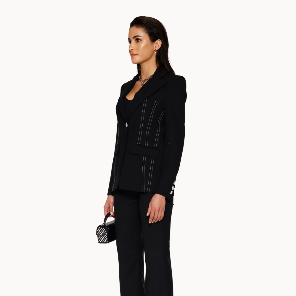 Shop online from our exclusive website. Discover the Onyx Corset Blazer, combining corset-inspired detailing with a structured blazer silhouette for a bold, refined look.