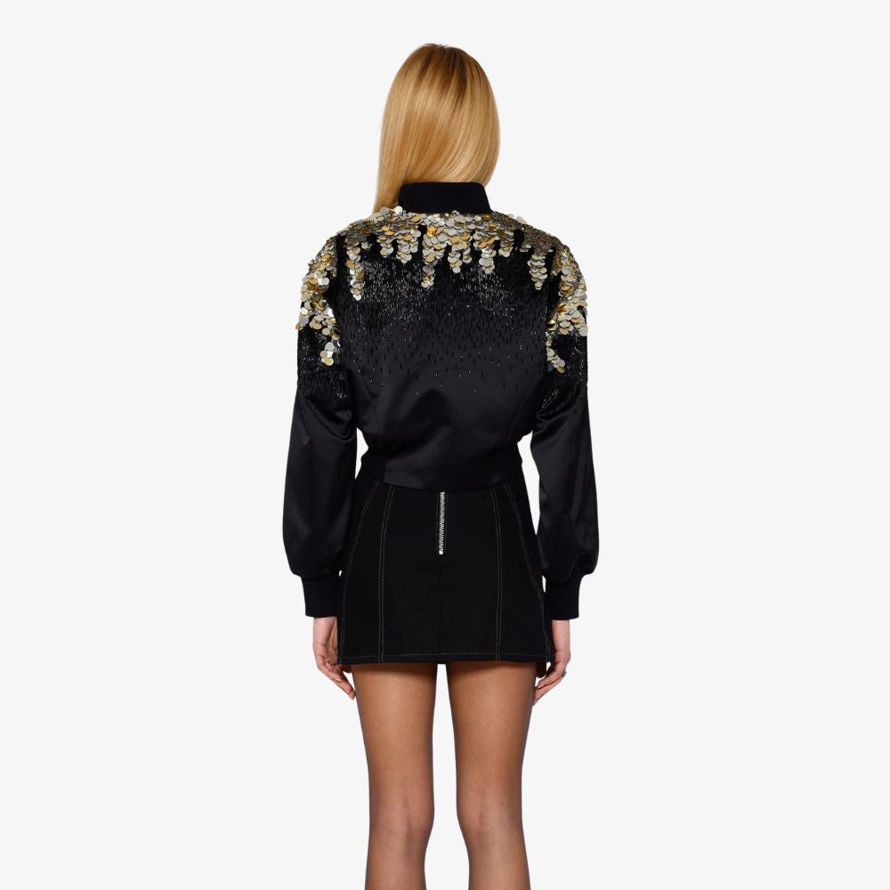Shop online from our exclusive website. Discover the Opulent Sequin Bomber Jacket, hand-embroidered with sequins and beads for a bold, statement-making look.