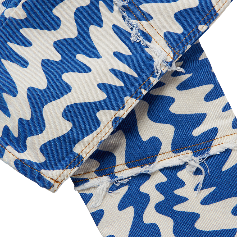 Horde Studio's Oren women's white jeans printed in a cerulean blue contrast pattern. Cut to a high-rise silhouette 