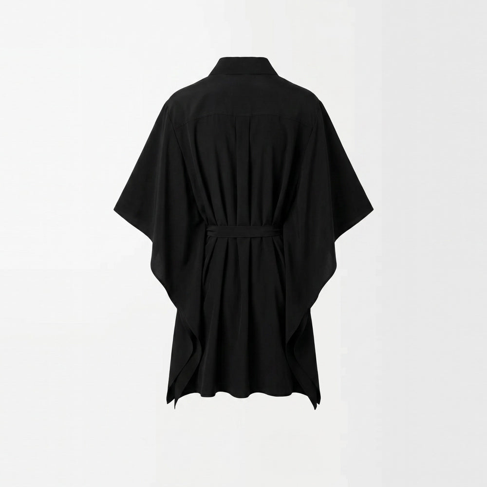 Shop online from our exclusive website and discover the Organic Cotton Kaftan Dress in Black by Benedetti Life, crafted from premium organic cotton for breathable comfort and timeless versatile elegance.