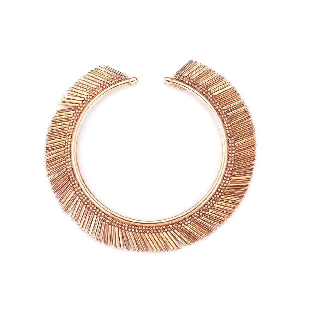 This unique bangle is inspired by the rays of sun radiating with each movement. 18ct Rose Gold Plated Bangle.