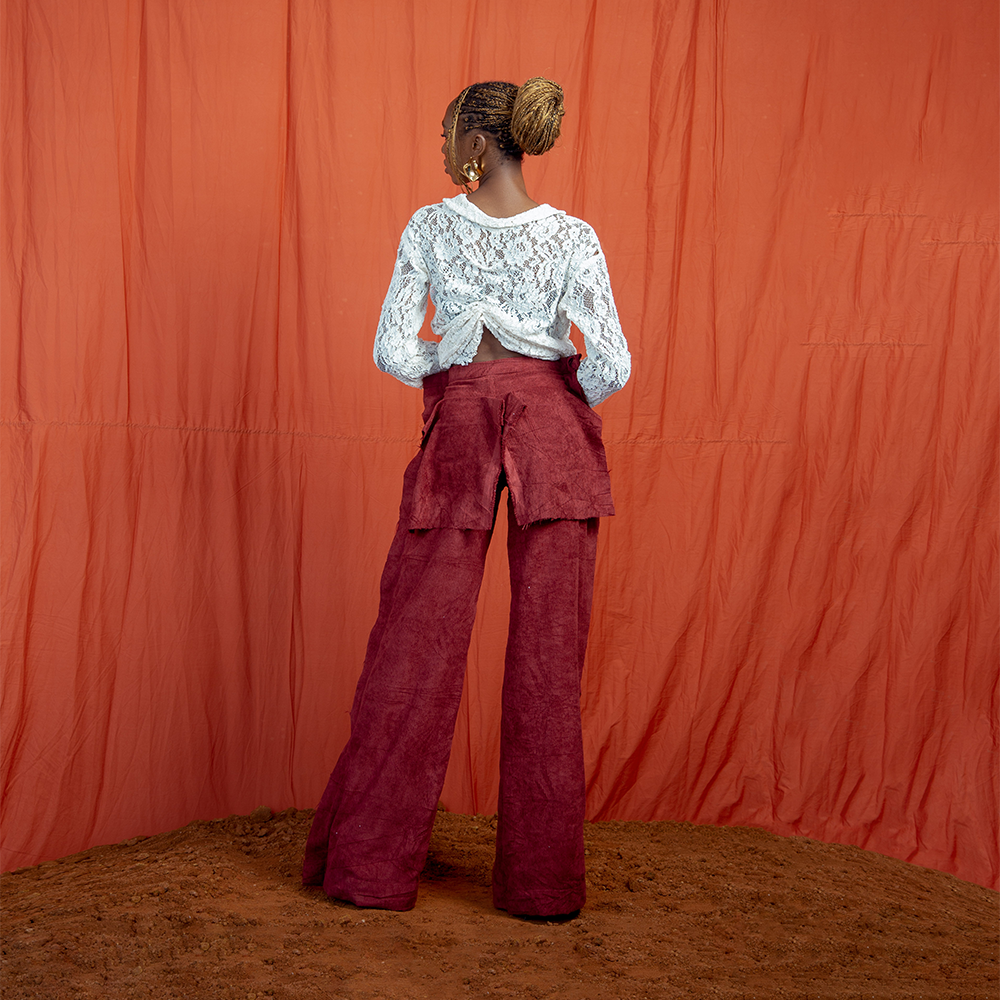 The Out-Seam Pants is an inversely sewn piece, featuring exaggerated side seams and patch pocket details with frayed edges. 