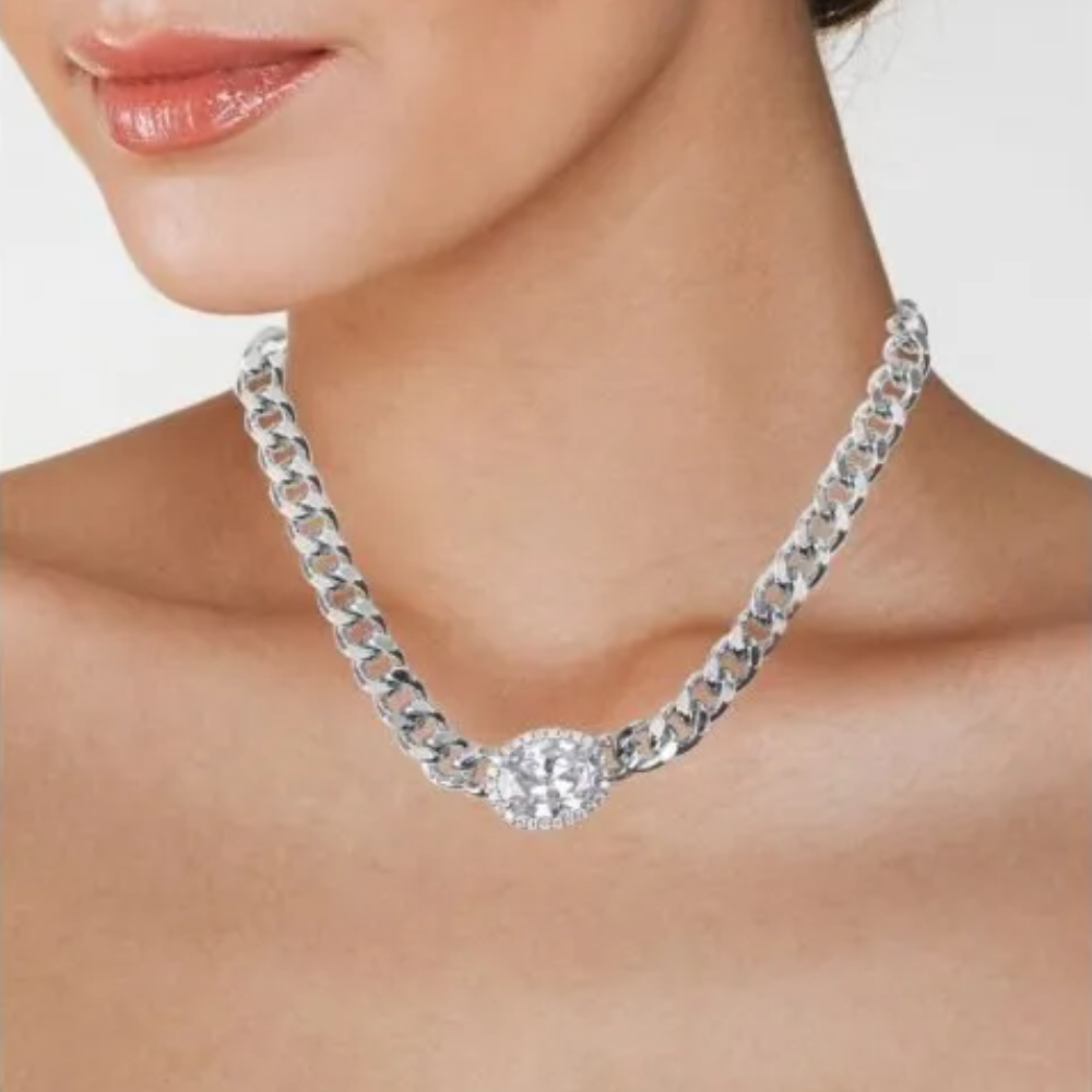 10 CTTW Oval Cubic Zirconia and pave CZ trim chunky chain necklace. Lobster clasp closure. Set in rhodium plated brass.