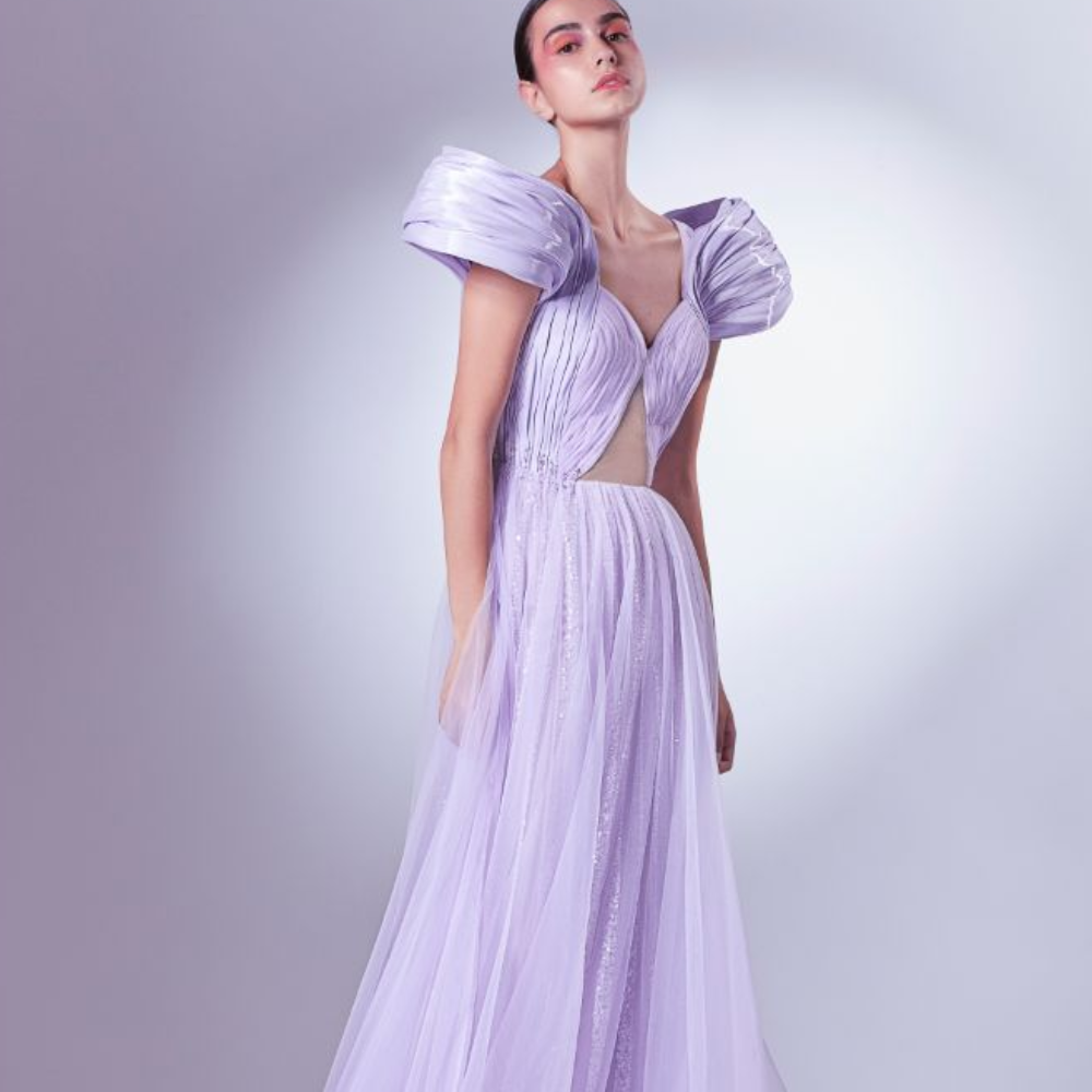 Rendered in a vivid lilac, this dress shoulders are constructed with ribbed organdie, merging with the pleated tulle bust.